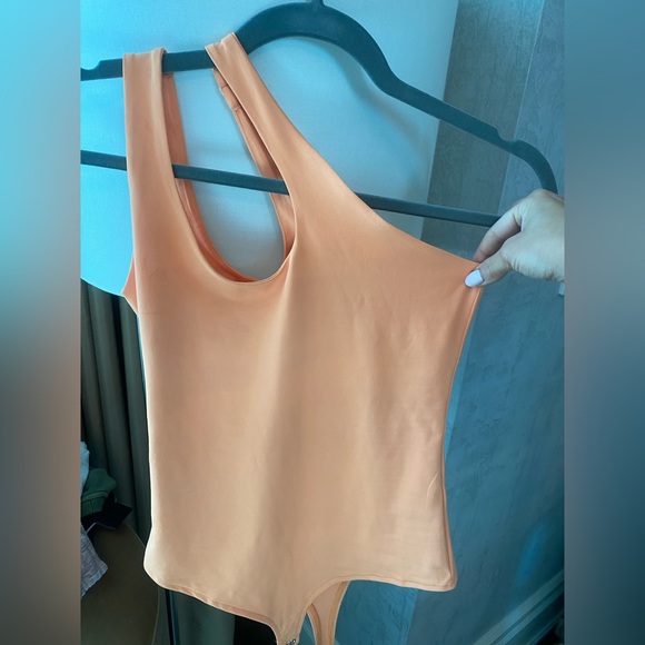 Side strap orange body suit (SMALL) worn once - Picture 2 of 3